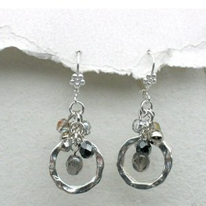 Shimmering Silver Circle Earrings by Edita