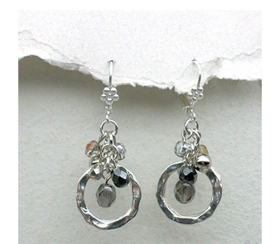 Shimmering Silver Circle Earrings by Edita